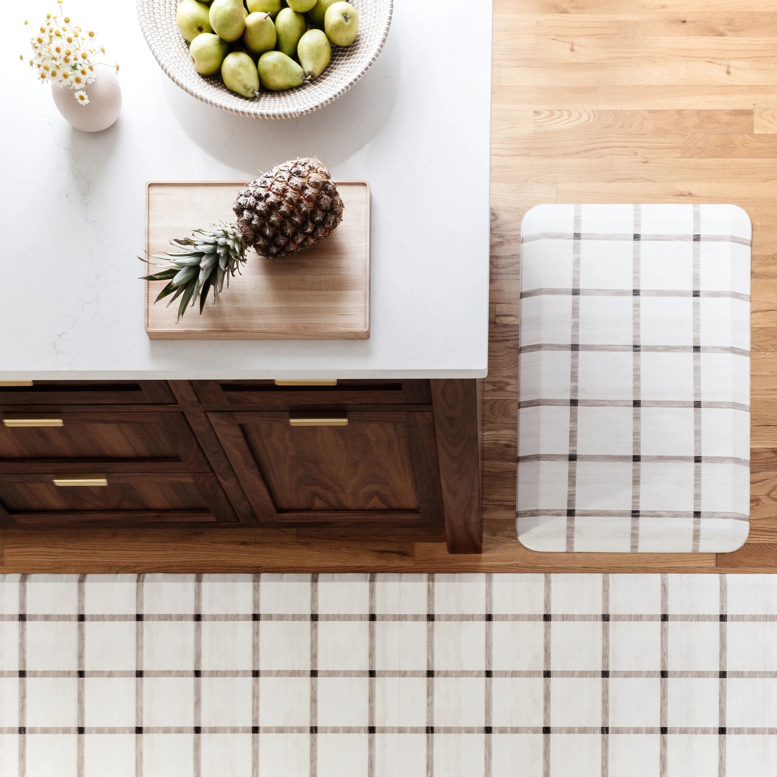 Windowpane neutral brown and white grid pattern standing mat. Shown in kitchen in sizes 30x108 and 20x32