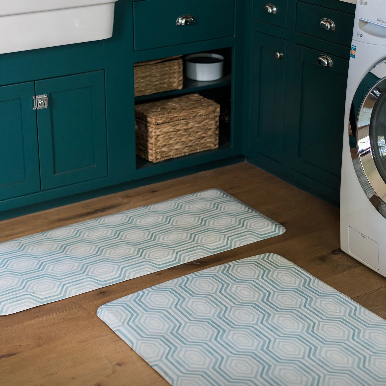 Blake waves blue geometric print kitchen mat shown in laundry room in sizes 20x72 and 30x108