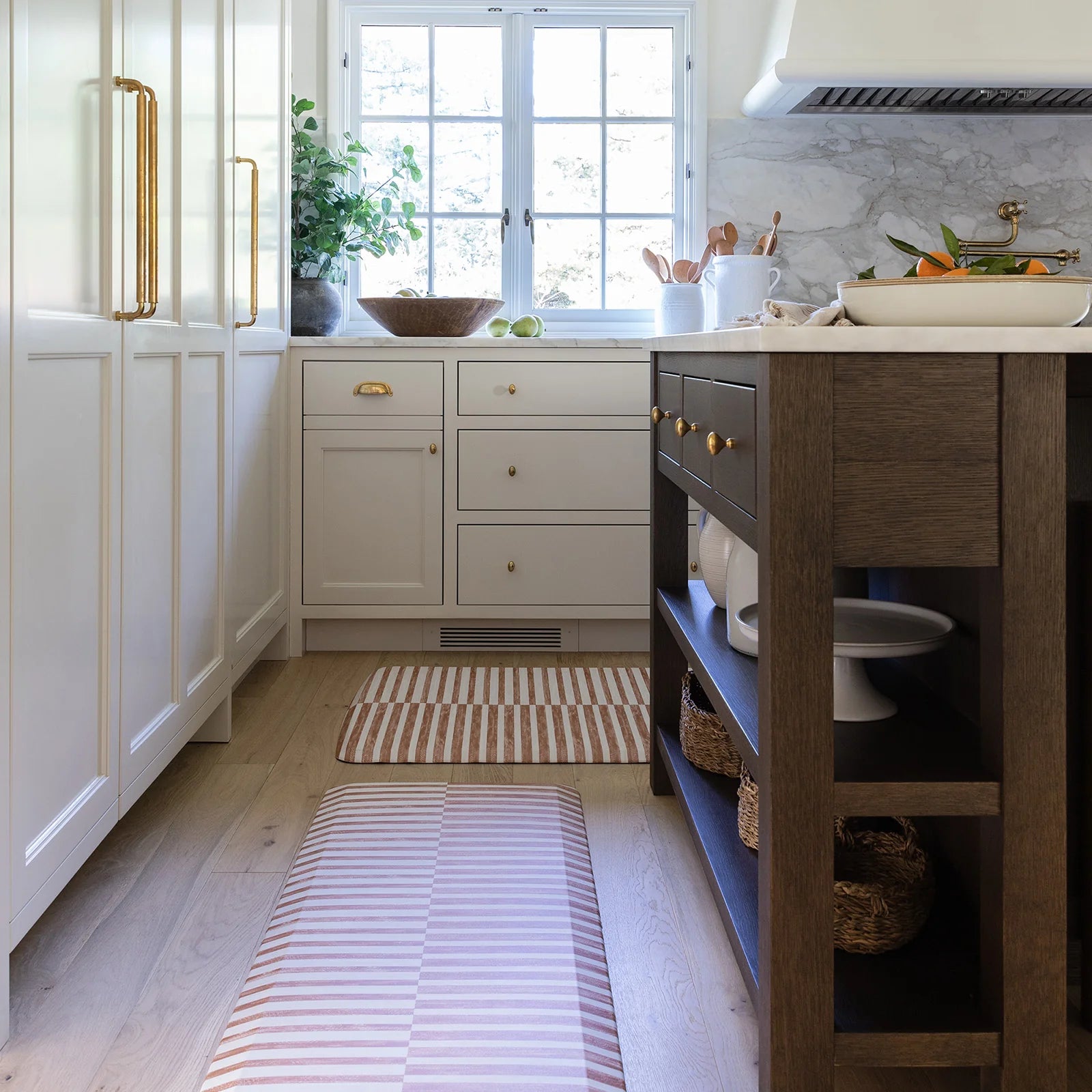 Reese terracotta brown and white inverted stripe standing mat shown in kitchen in sizes 30x72 and 30x108