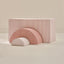 Peony Arch Set: a large pink and white striped arch block, a pink floral arch and a small pink striped half-round, nested together on a beige background.