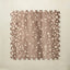 A square interlocking foam play mat tile in walnut brown with scattered hand-painted cream fawn spots, shown from above on a light beige background.