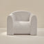 Modern play chair with blue stripes on a neutral background