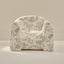 Floral patterned armchair on a neutral background