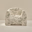 Floral-patterned armchair on a neutral background