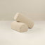 Two beige boucle armrests on a light background, designed to be attached to a sofa or chair for additional comfort.