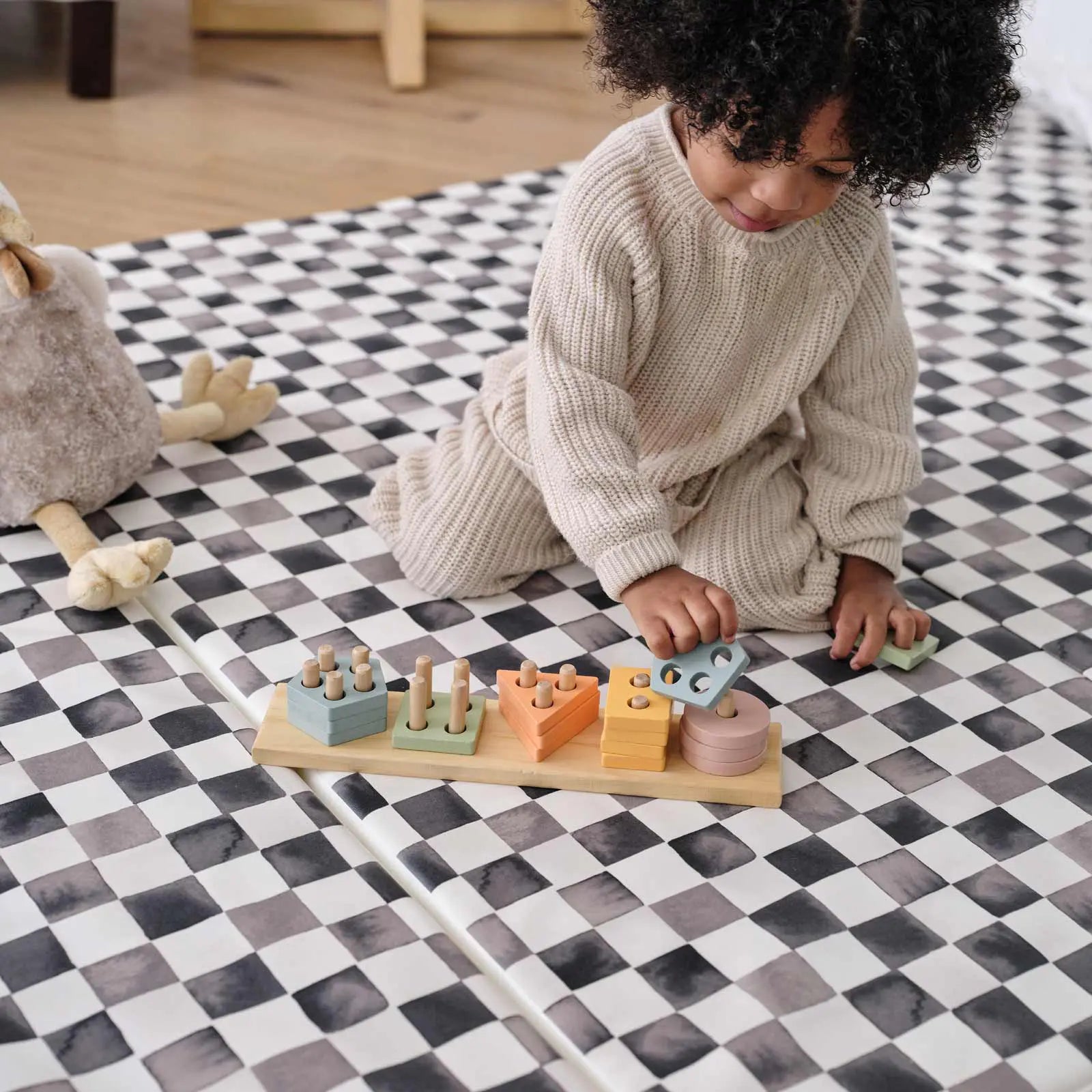 New Milestones
For Their Next Stage Of Play
A whole new mat experience for a whole new stage in parenting. As the kids get older, the activities get crazier. Which is why our tumbling mats are made with extra padding using a layer of sturdy base foam topped with a thick layer of memory foam, all within a beautiful, hand illustrated wipe-clean cover.