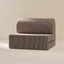 Brown striped sofa bed on a beige background