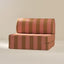 Striped play couch seat with pink and brown stripes on a beige background