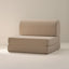 A beige foldable chair with a removable backrest, made of soft fabric, placed against a neutral background.
