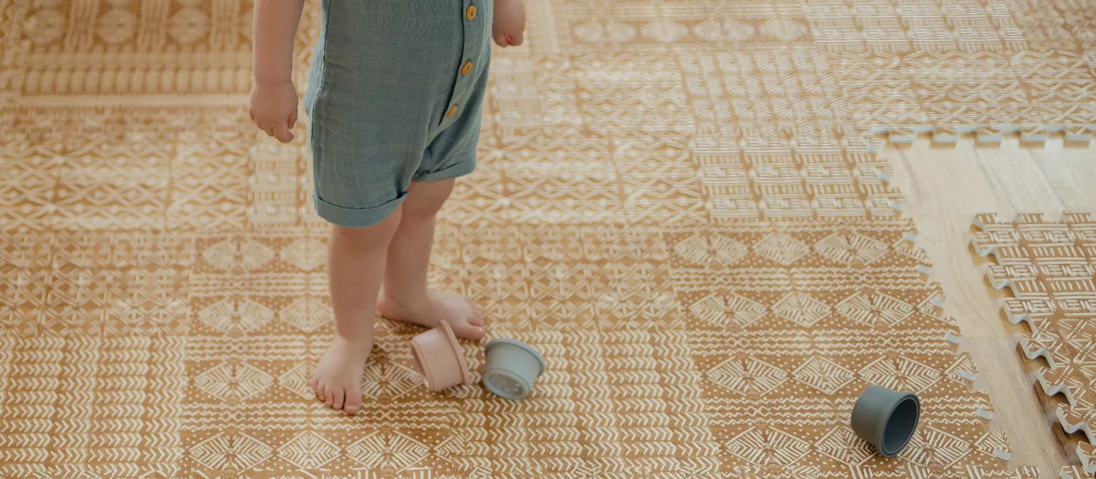 Indie Honey Yellow Gold Play Mat with toddler playing