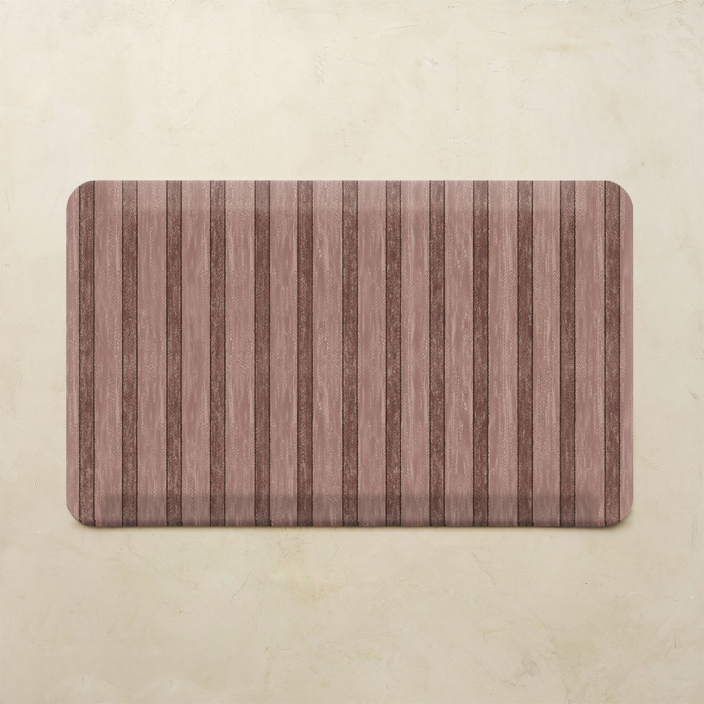 Maroon kitchen mat with striped pattern on a beige background