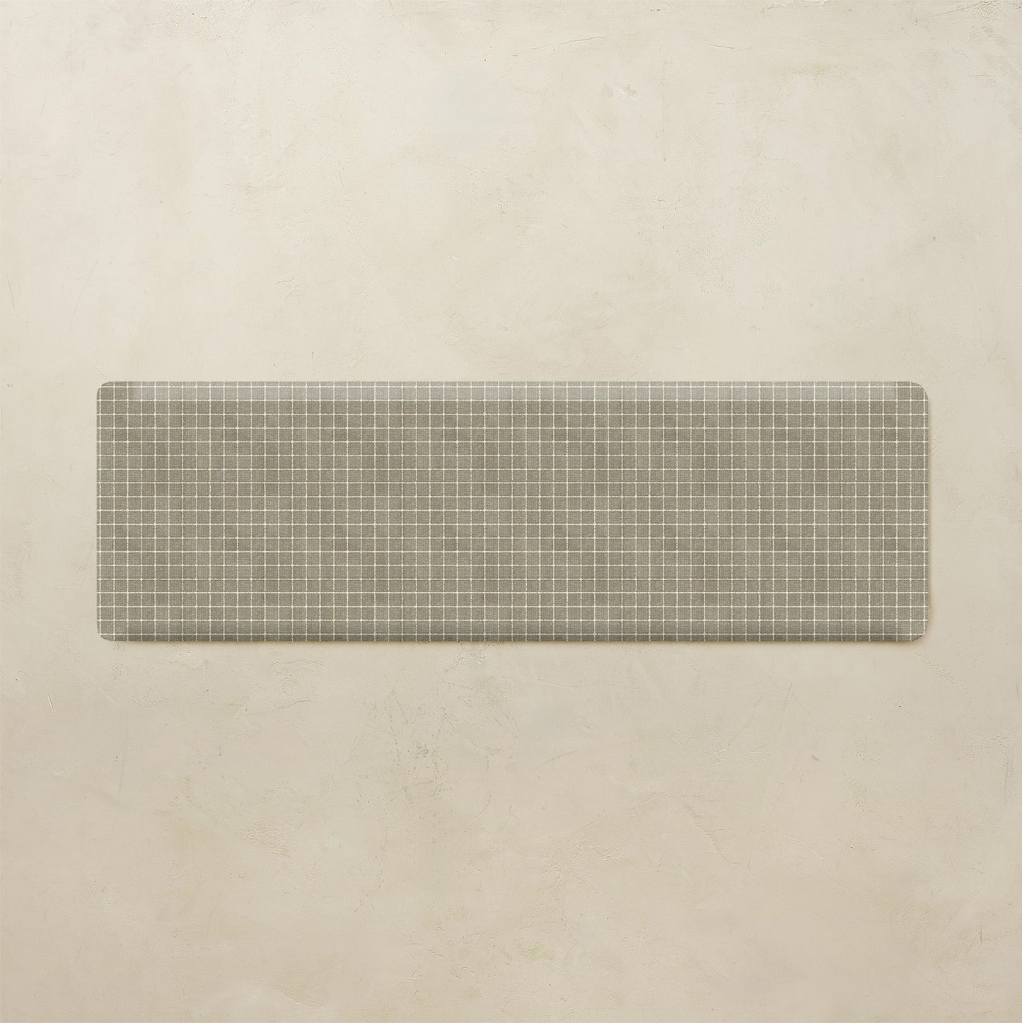 Rectangular metal grid on a beige background