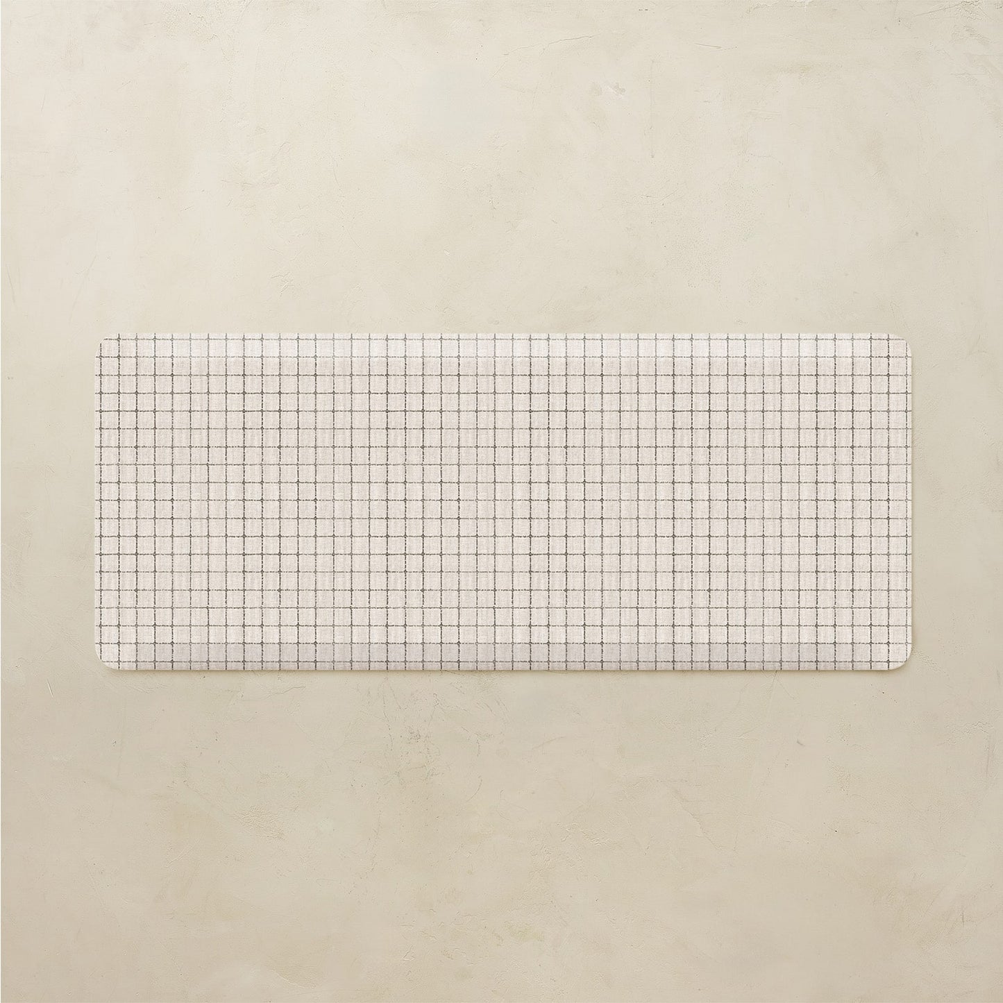 Rectangular grid mat on a beige background