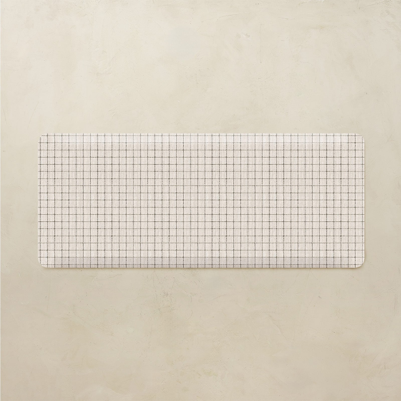 Rectangular grid mat on a beige background