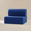 Blue play couch on a beige background