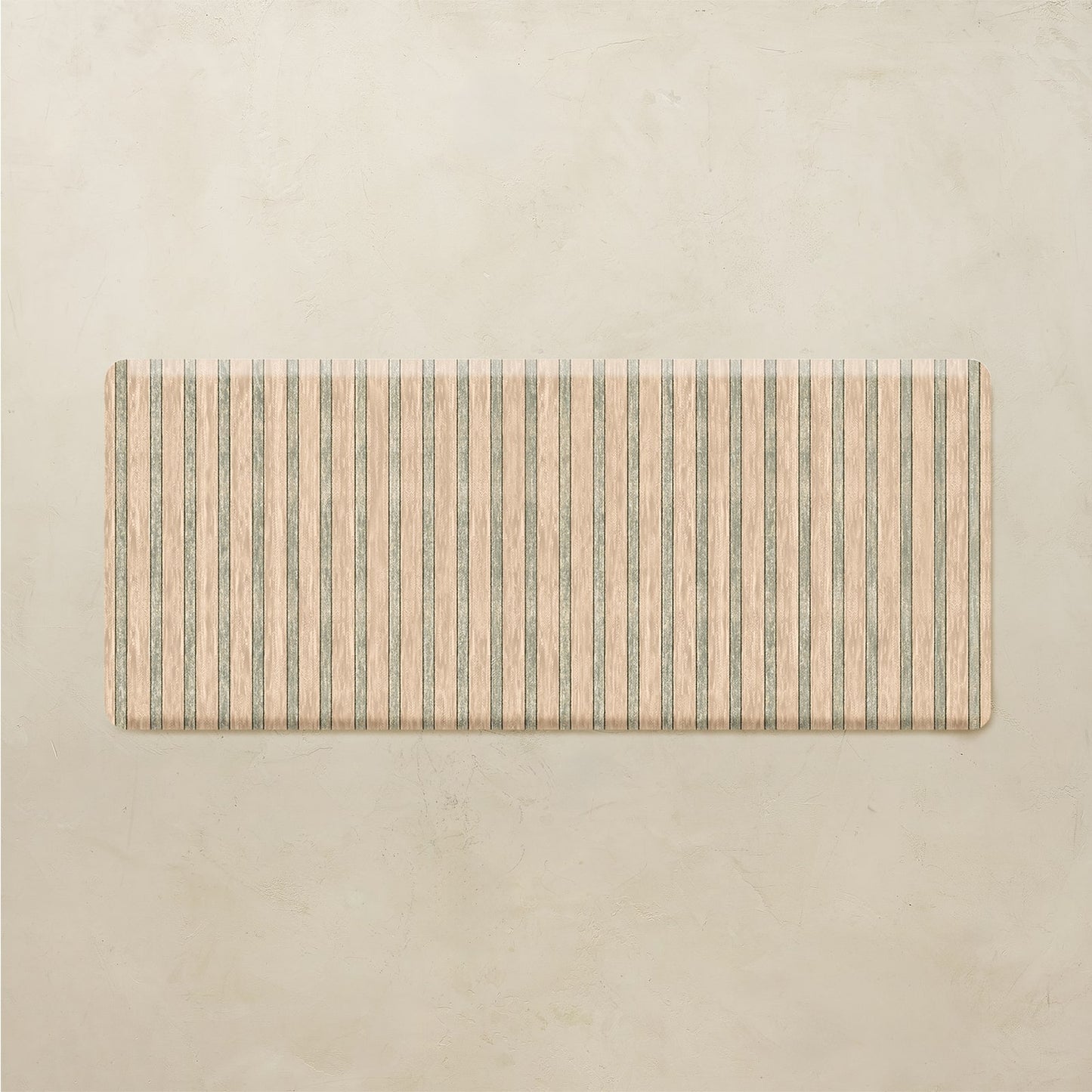 Rectangular mat with striped pattern on a beige background