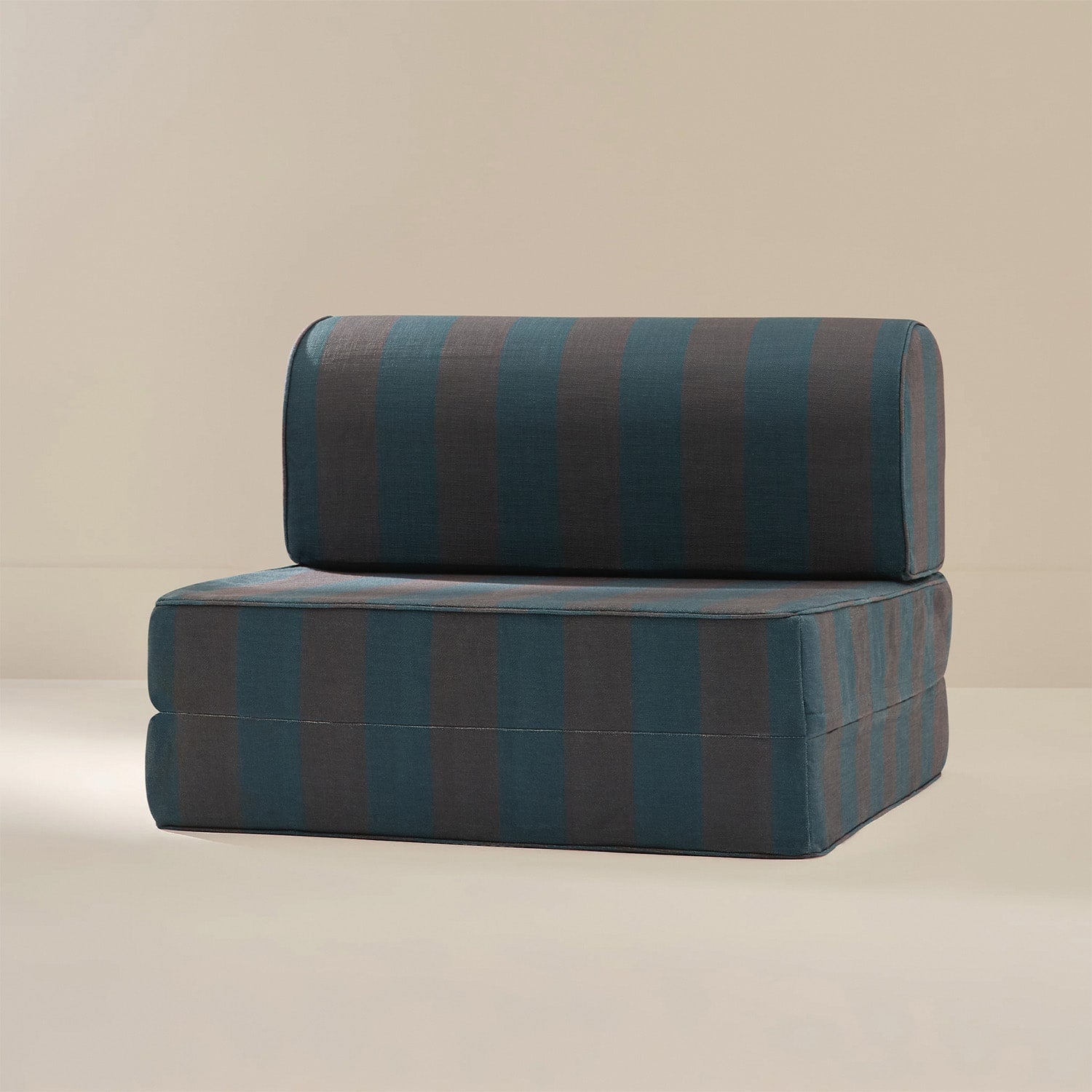 Striped modular sofa on a beige background