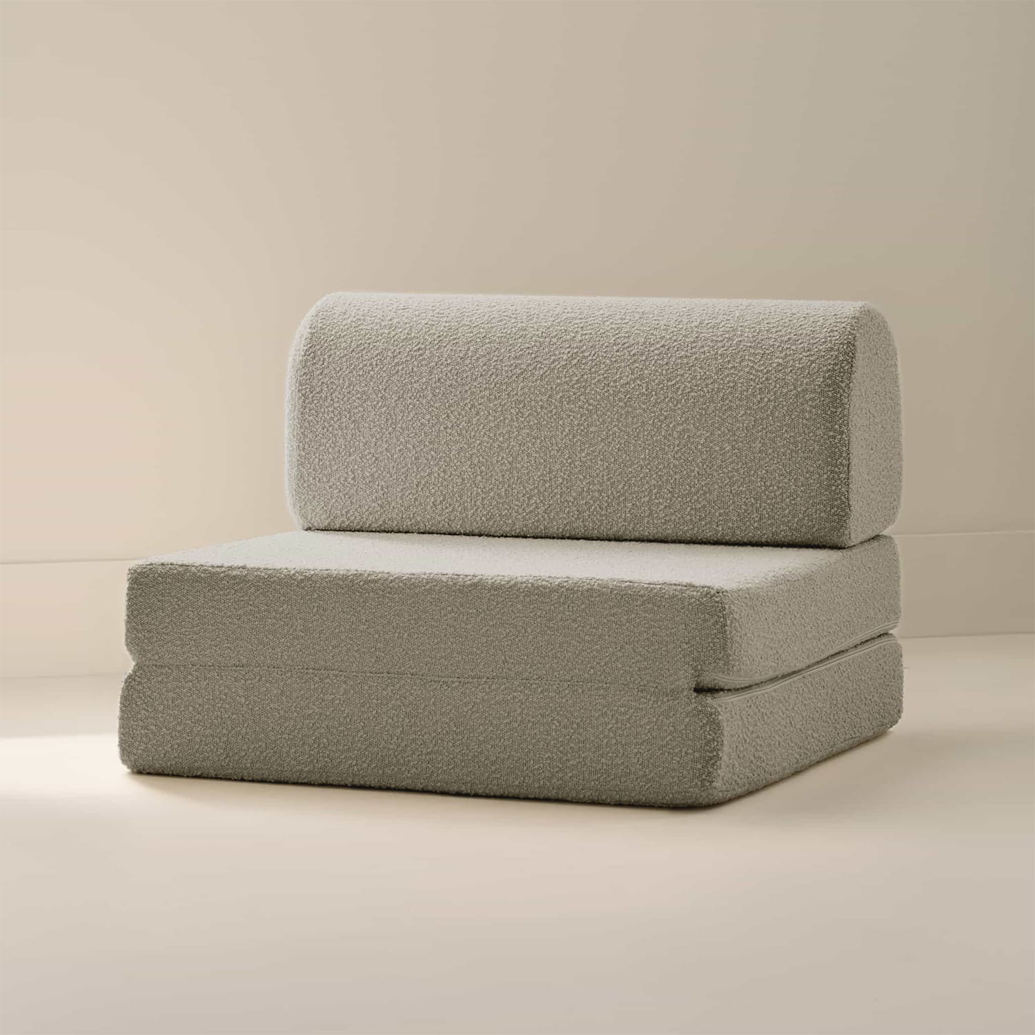 A blue textured cushioned seat foldable chair.