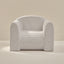 Modern play chair with blue stripes on a neutral background