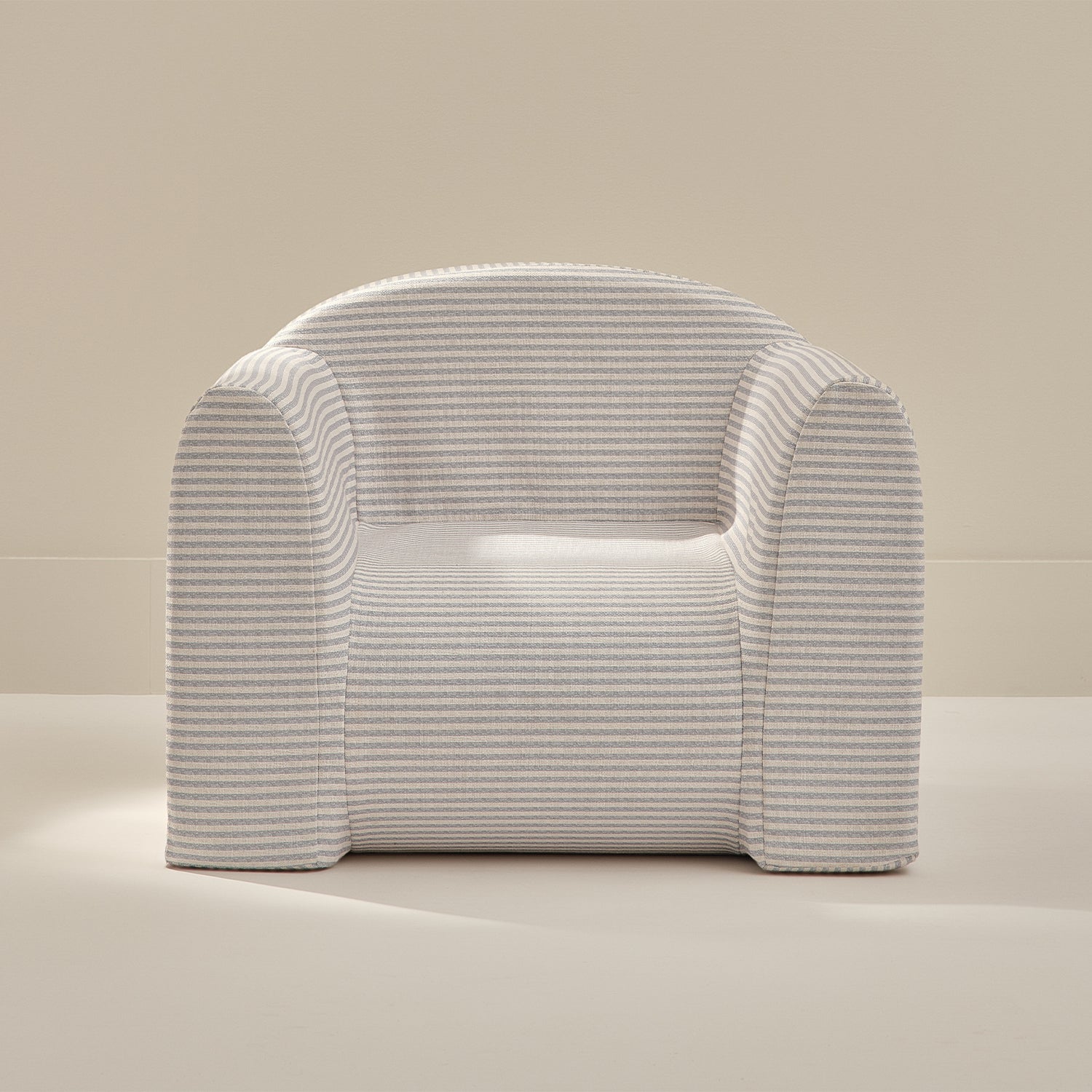 Modern play chair with blue stripes on a neutral background