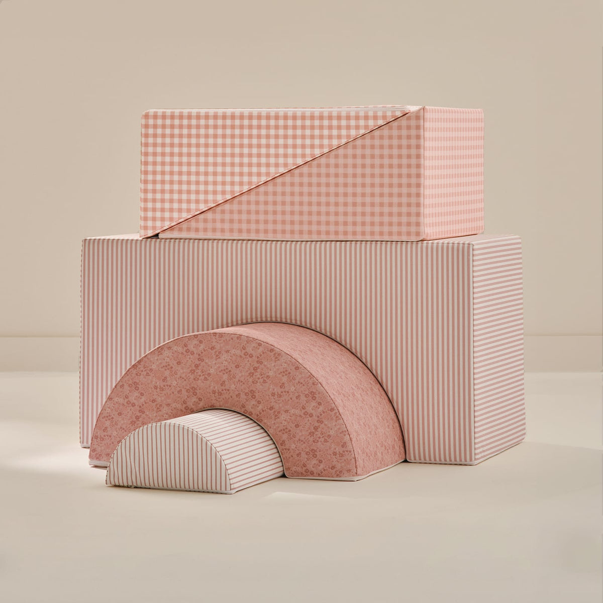 Peony Play Set Bundle: the complete Arch Set and Wedge Set in pink stripes, florals and gingham on a beige background.