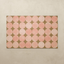 Ori Raspberry 4x6 tumbling mat with watercolor pink dots on a caramel base