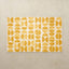 Selene Honey 4x6 tumbling mat with watercolor golden yellow half-circles on a white base