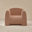 Pink textured armchair on a beige background
