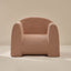 Pink textured armchair on a beige background