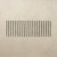 Rectangular bath rug with green vertical stripes on a beige background