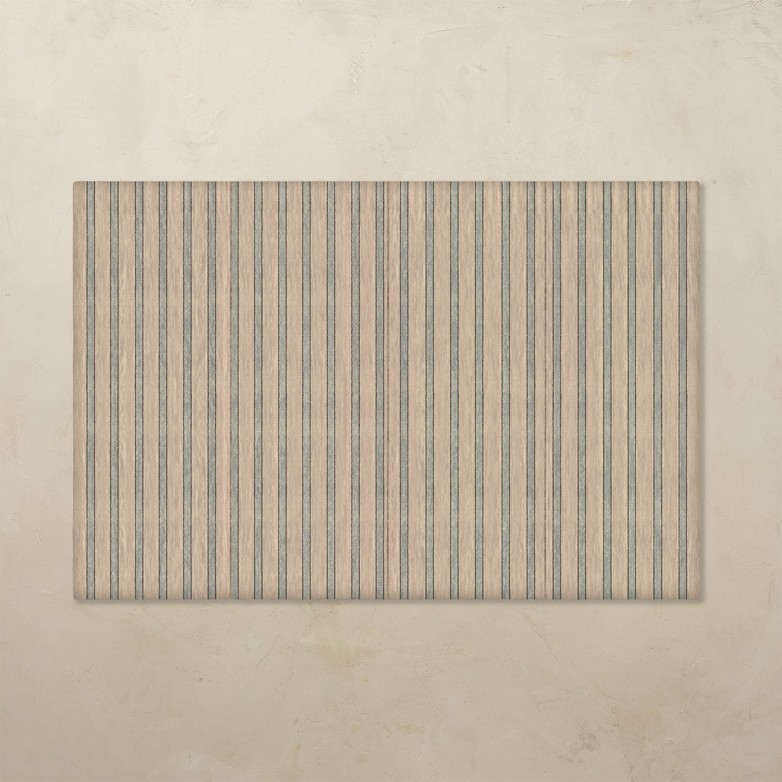 Rectangular tumbling mat with vertical stripes on a beige background