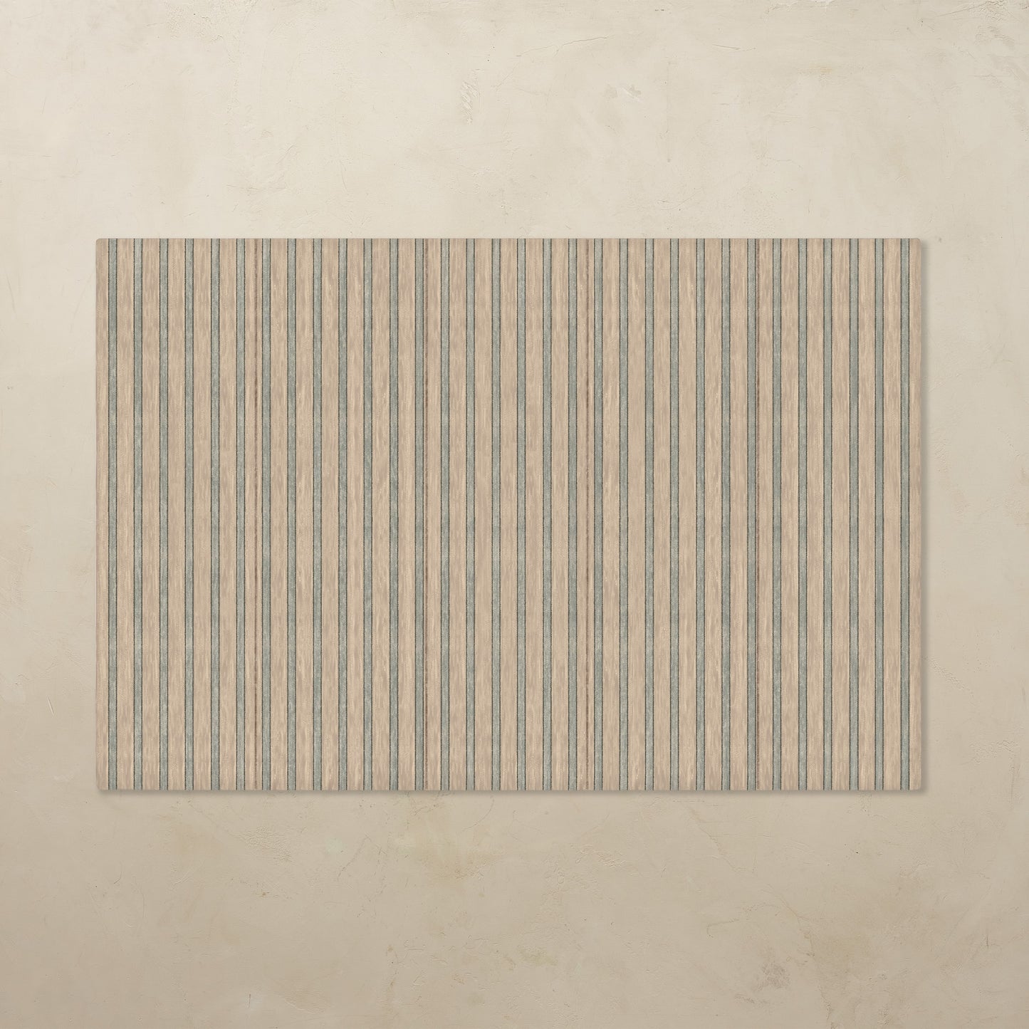 Rectangular tumbling mat with vertical striped pattern on a beige background