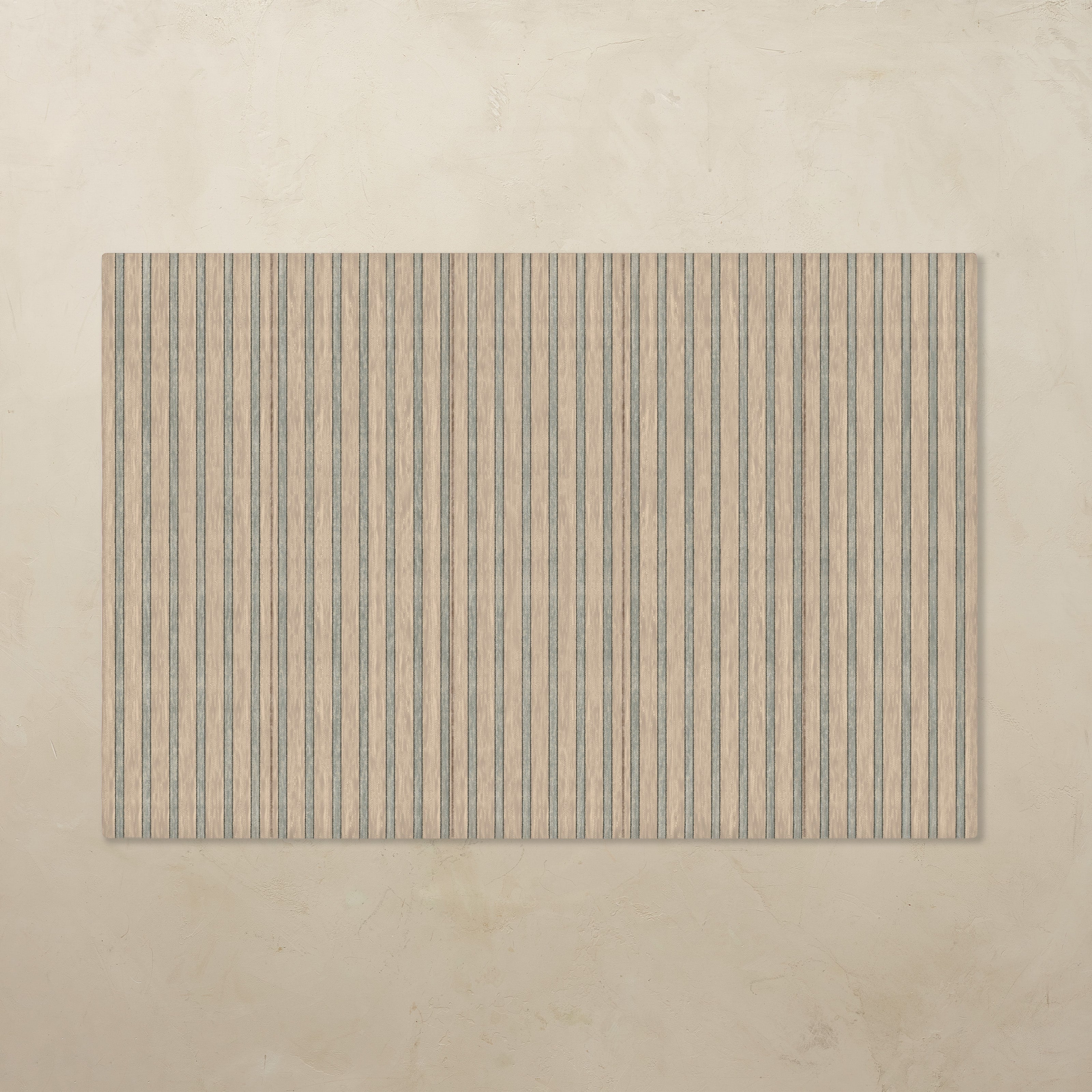 Rectangular tumbling mat with vertical striped pattern on a beige background