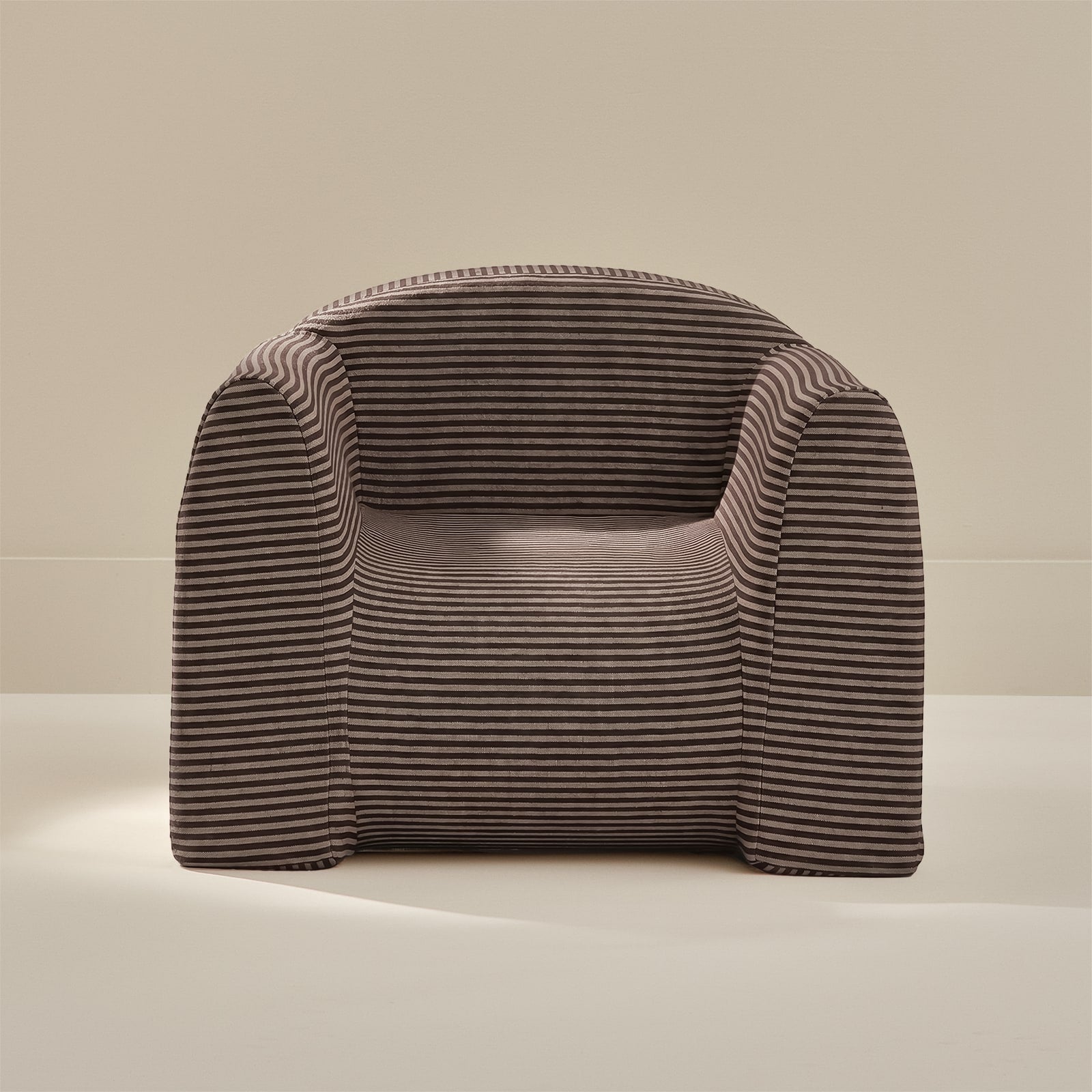 Striped armchair on a neutral background