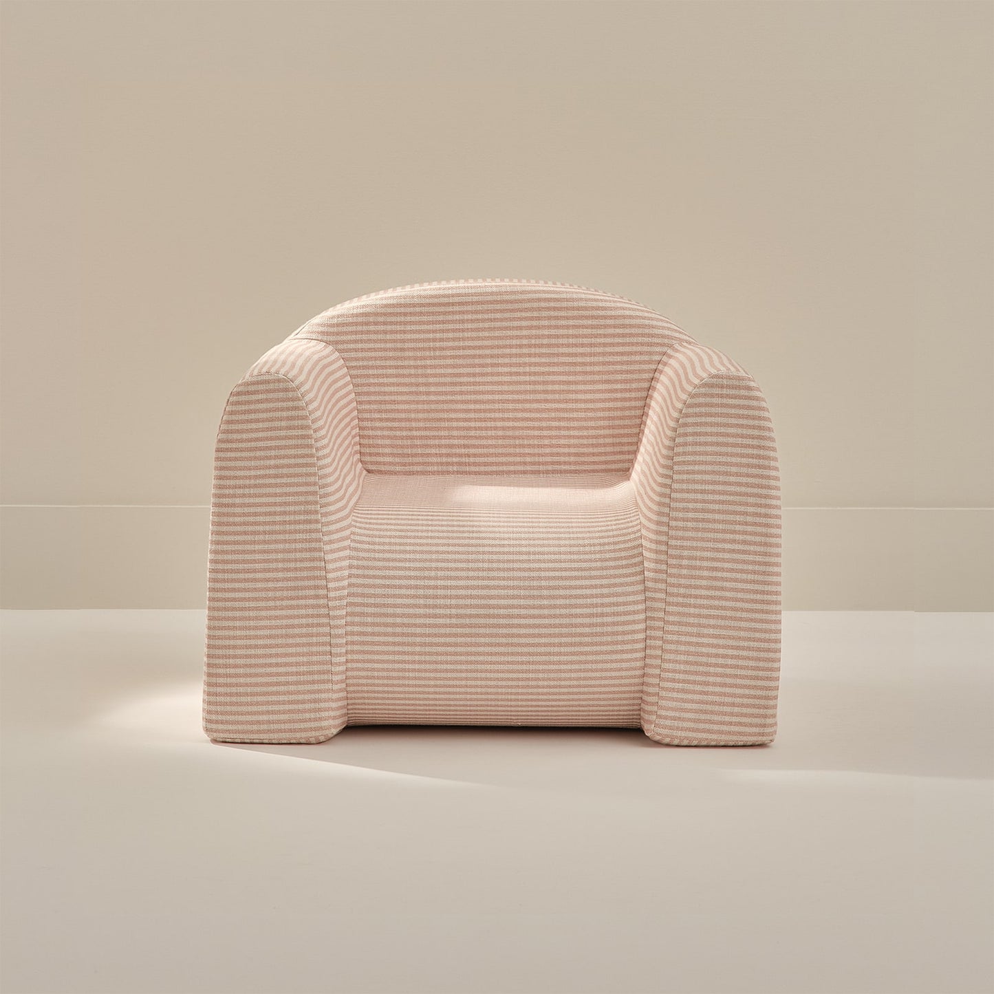 Pink striped play chair on a neutral background