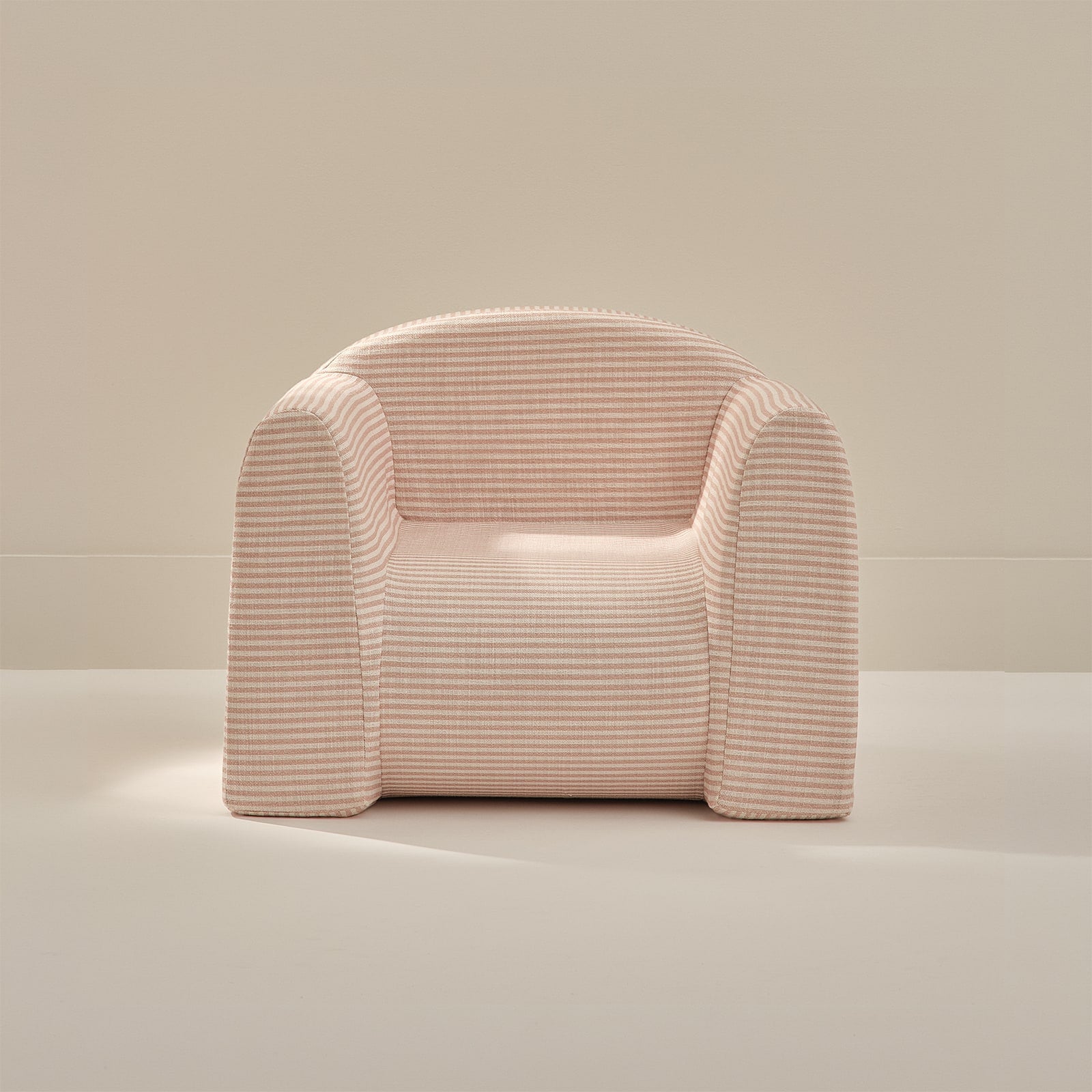 Pink striped play chair on a neutral background