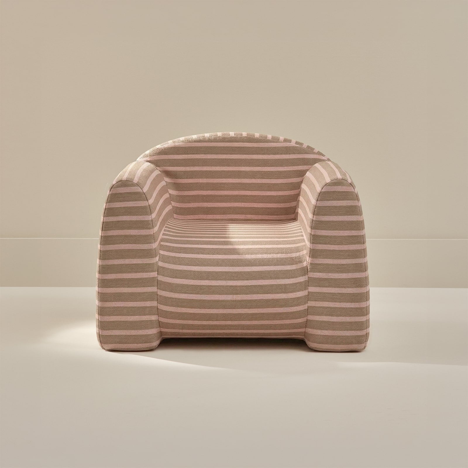 Striped armchair on a neutral background