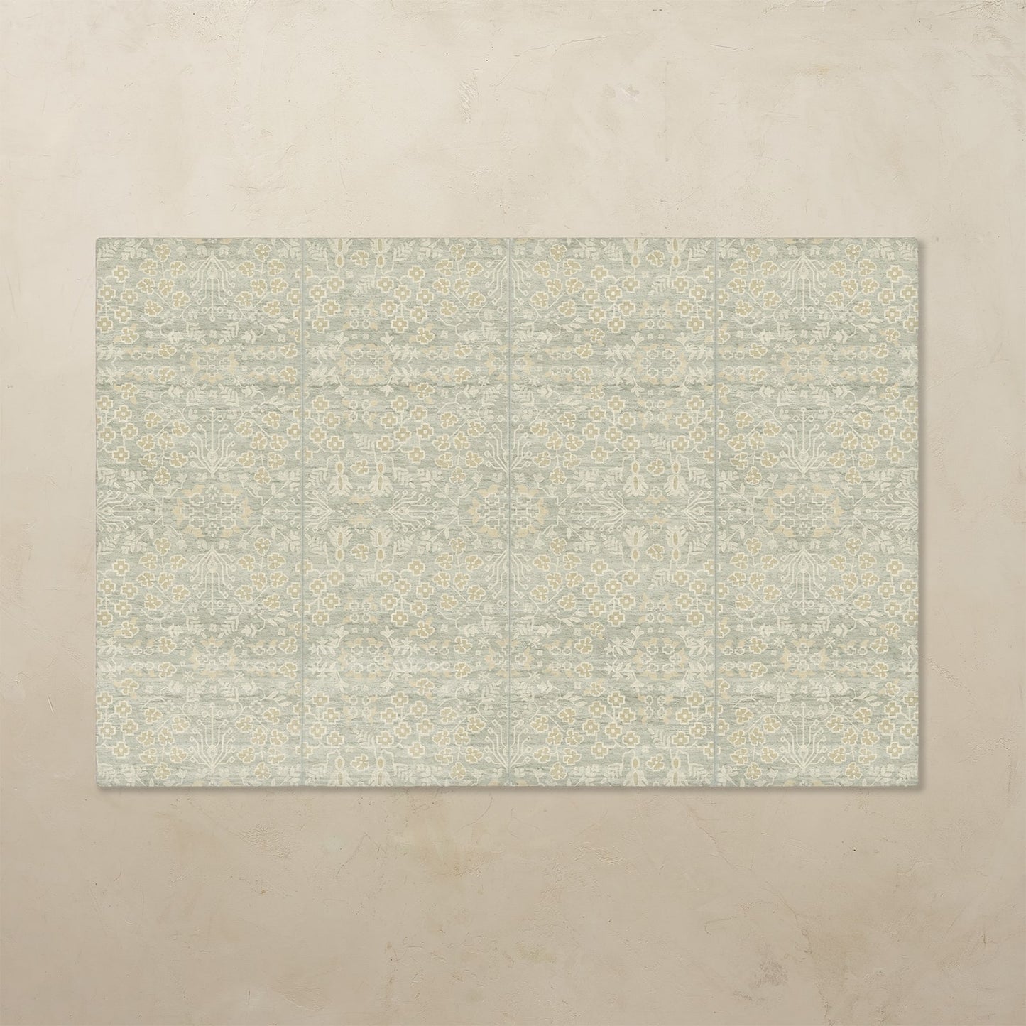 Rectangular tumbling mat with a subtle pattern on a beige background