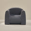 Striped cushion with a geometric pattern on a beige background