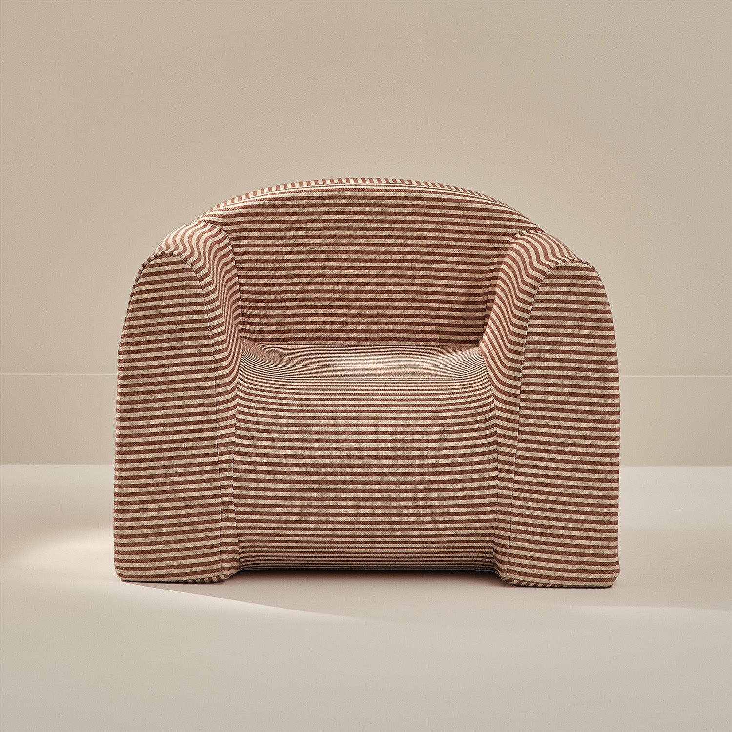Striped armchair on a neutral background