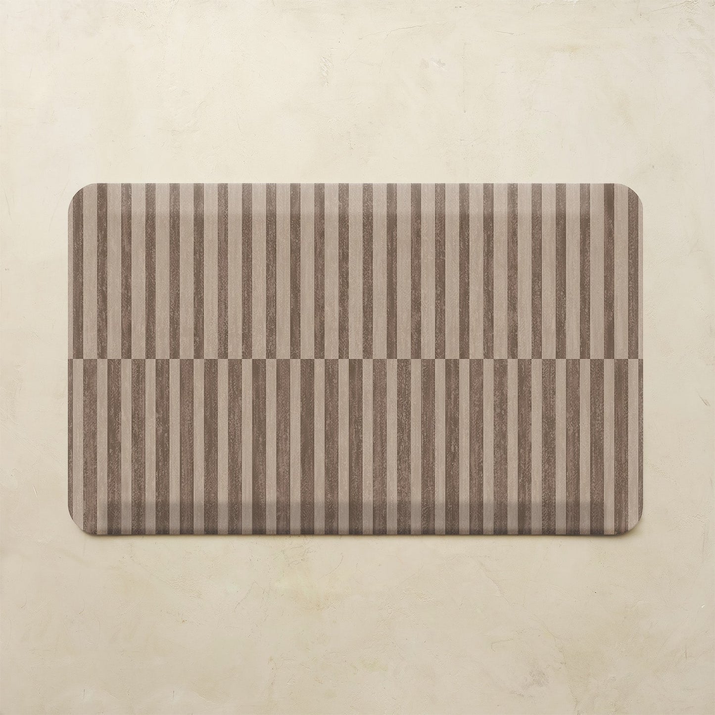 Rectangular mat with horizontal striped pattern on a beige background