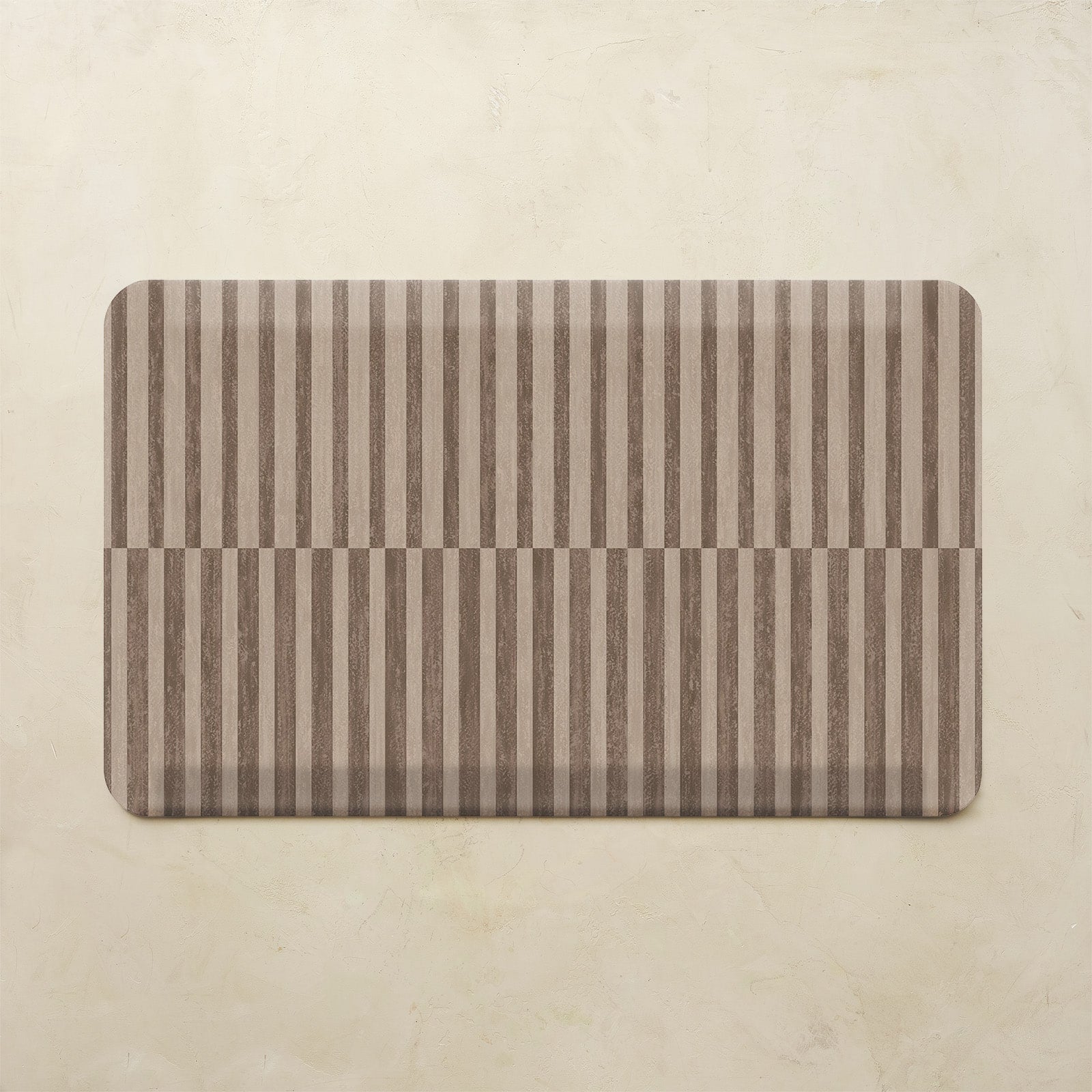 Rectangular mat with horizontal striped pattern on a beige background