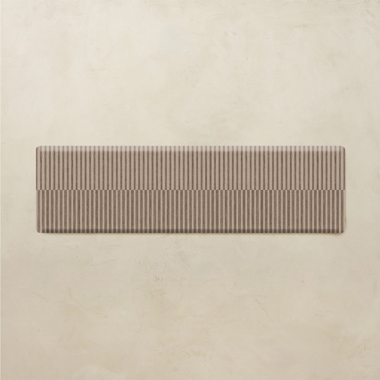 Rectangular kitchen mat on a beige background
