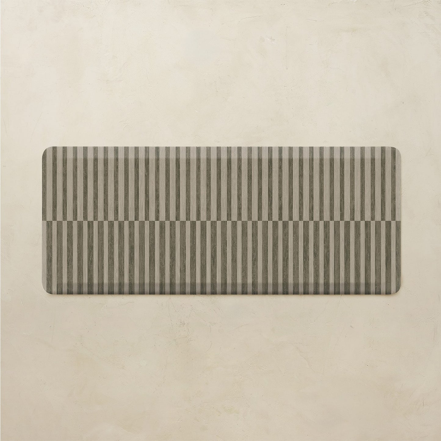 Rectangular mat with striped pattern on a beige background