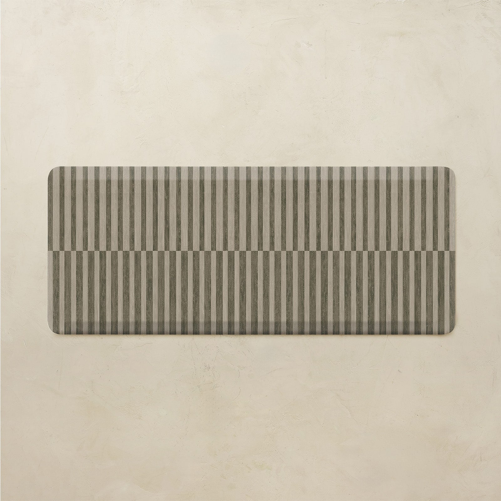 Rectangular mat with striped pattern on a beige background