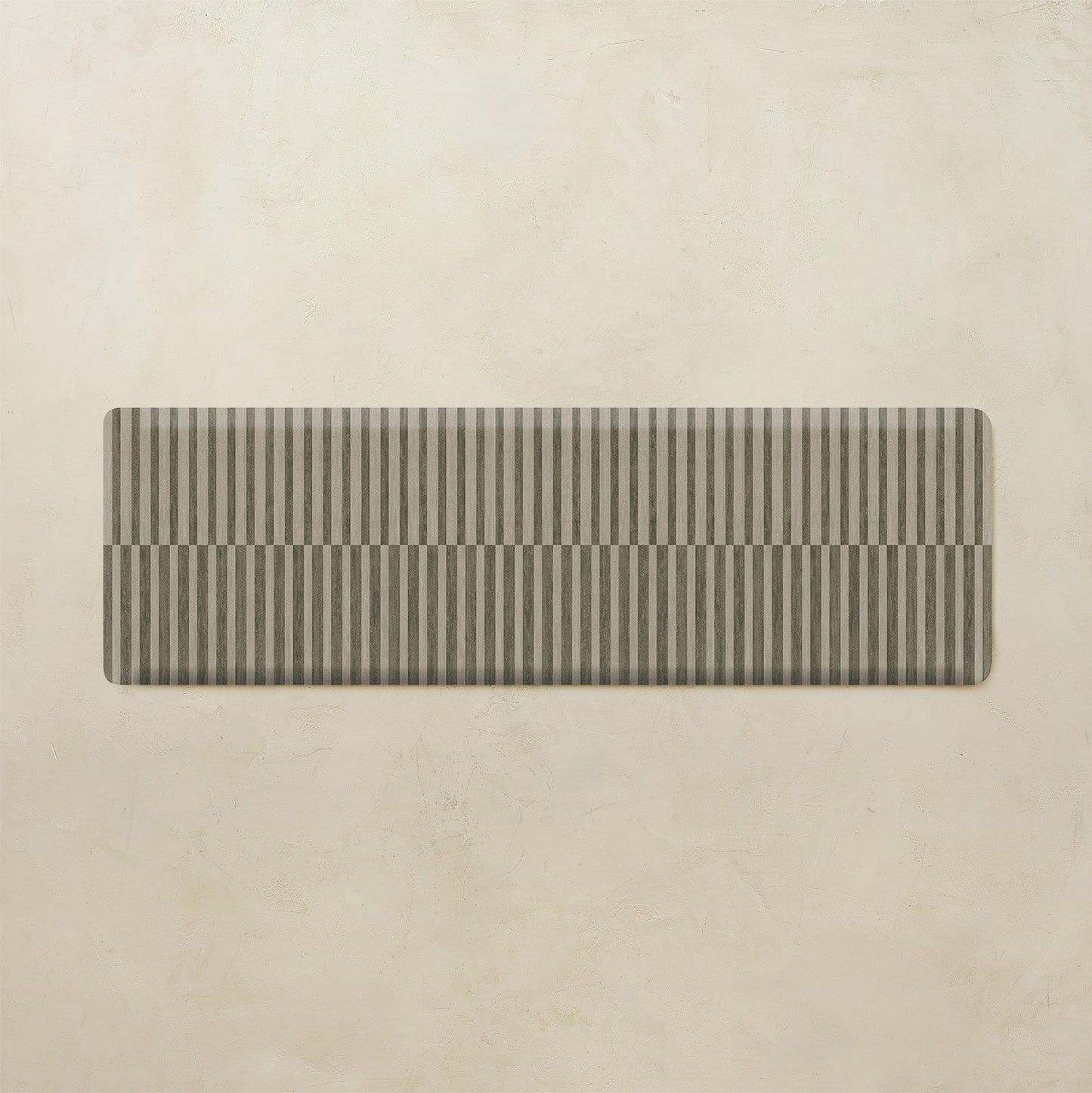 Rectangular kitchen mat on a beige background