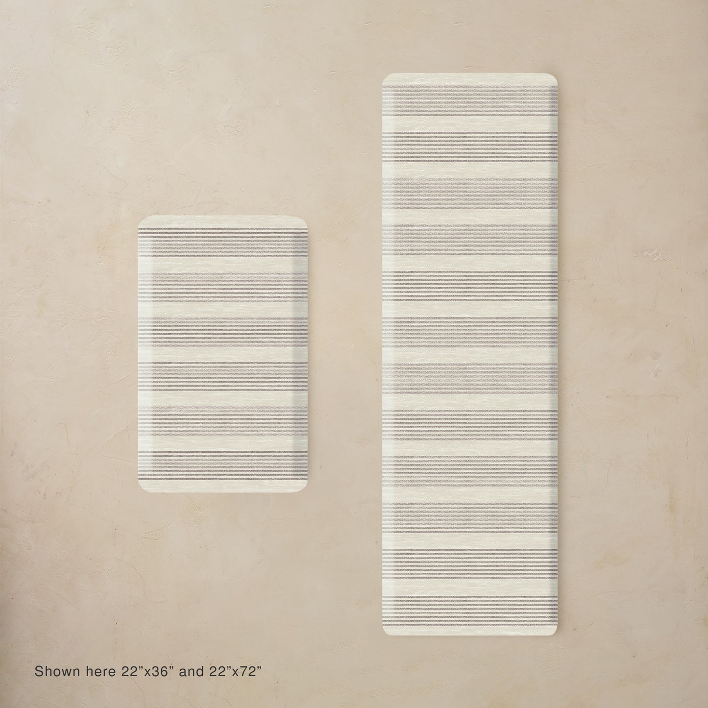Two rectangular mats with striped pattern on a beige background