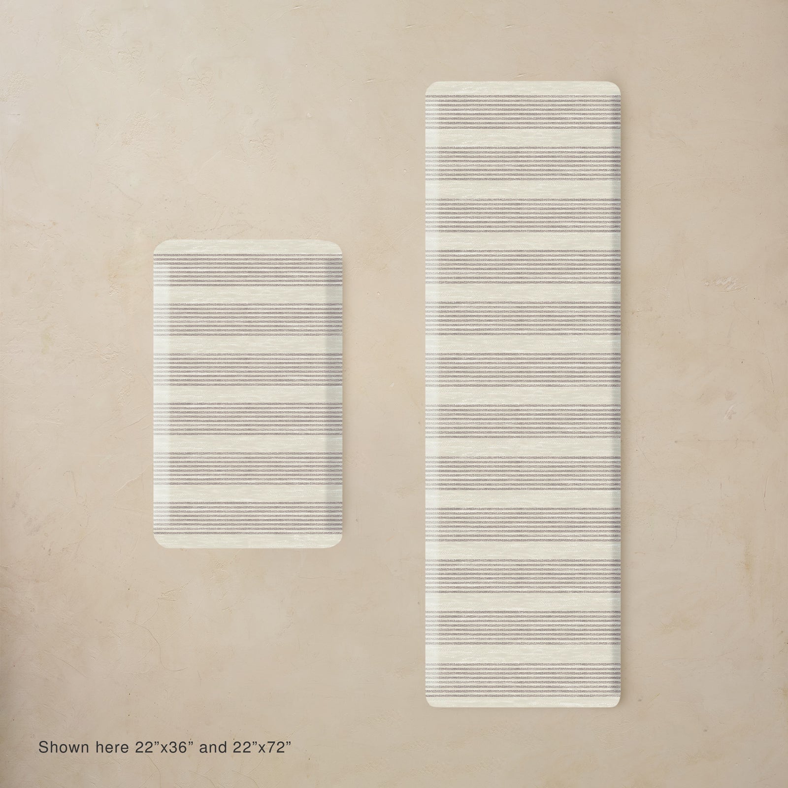 Two rectangular mats with striped pattern on a beige background