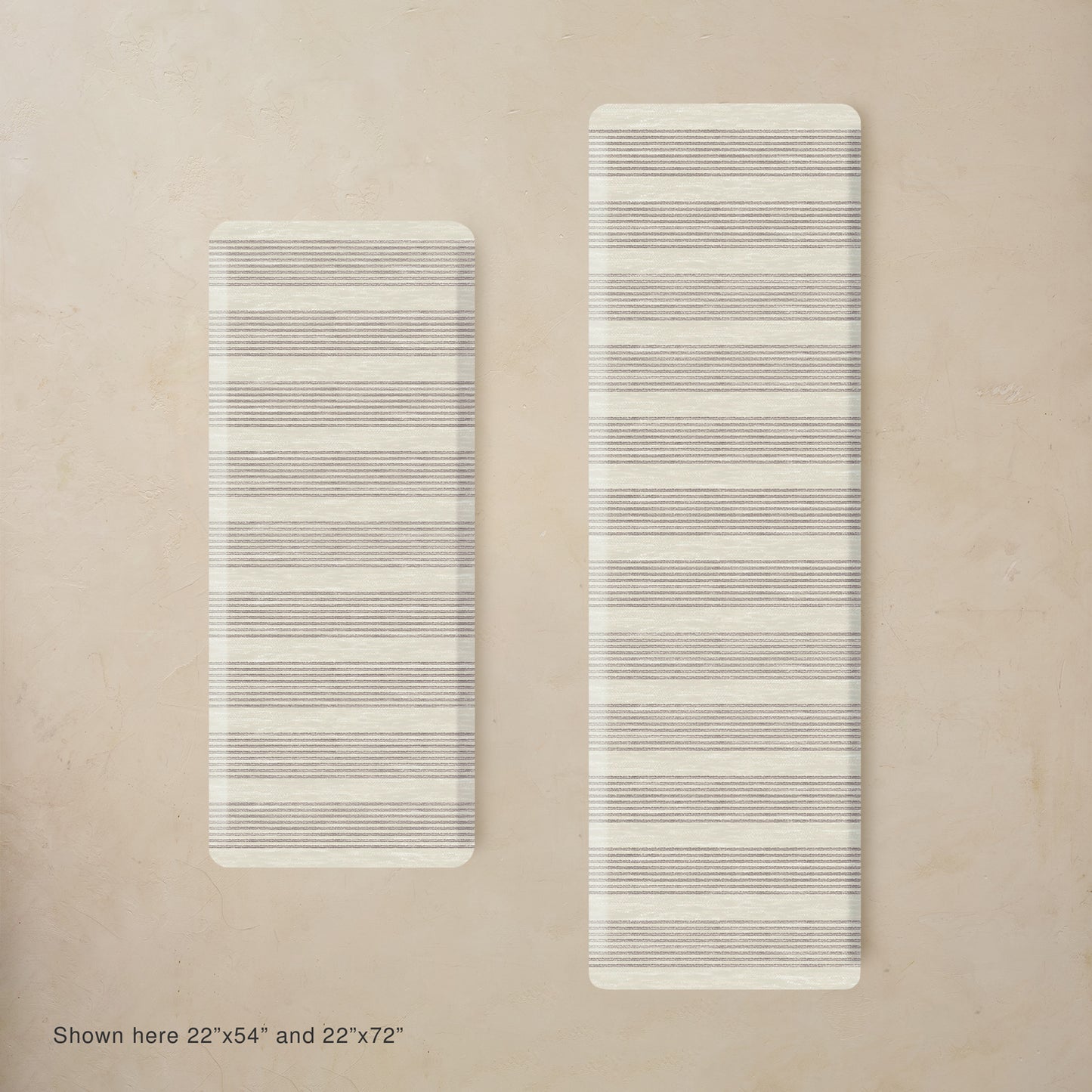 Two rectangular kitchen mats with striped pattern on a beige background