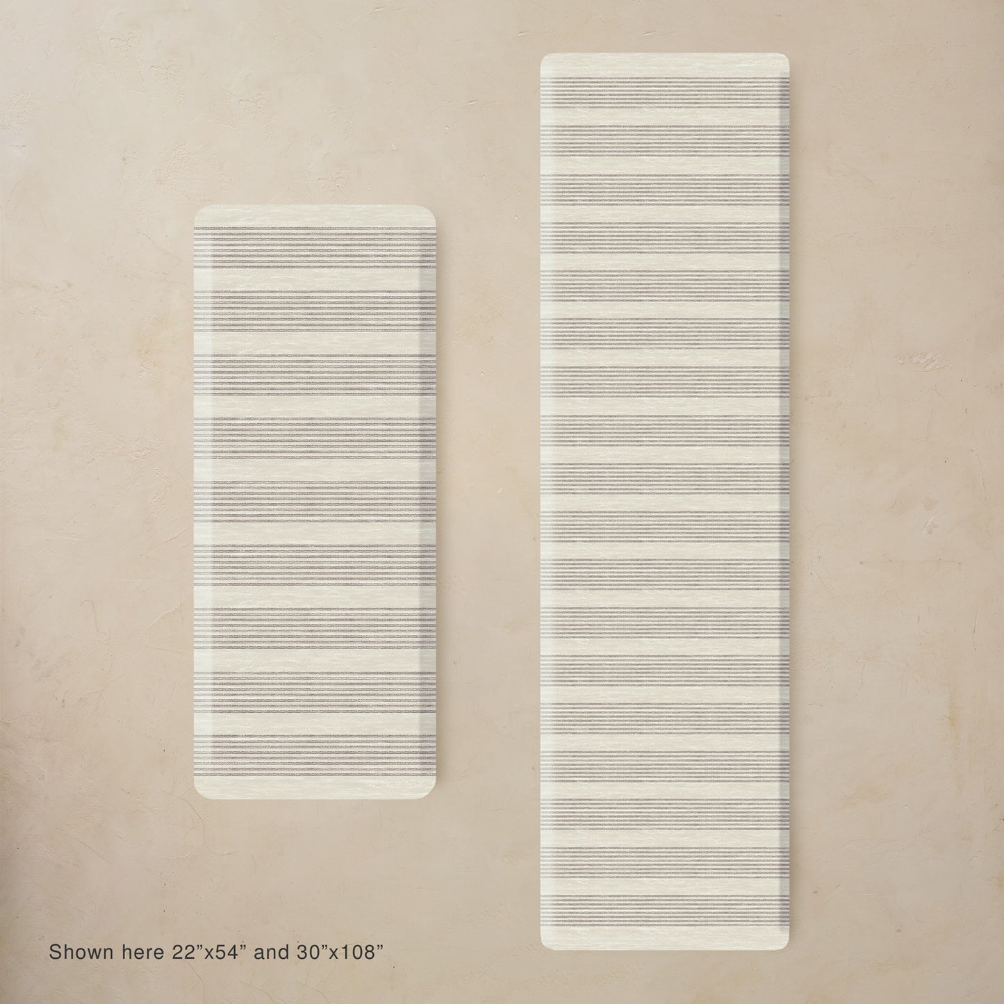 Two striped mats on a beige background